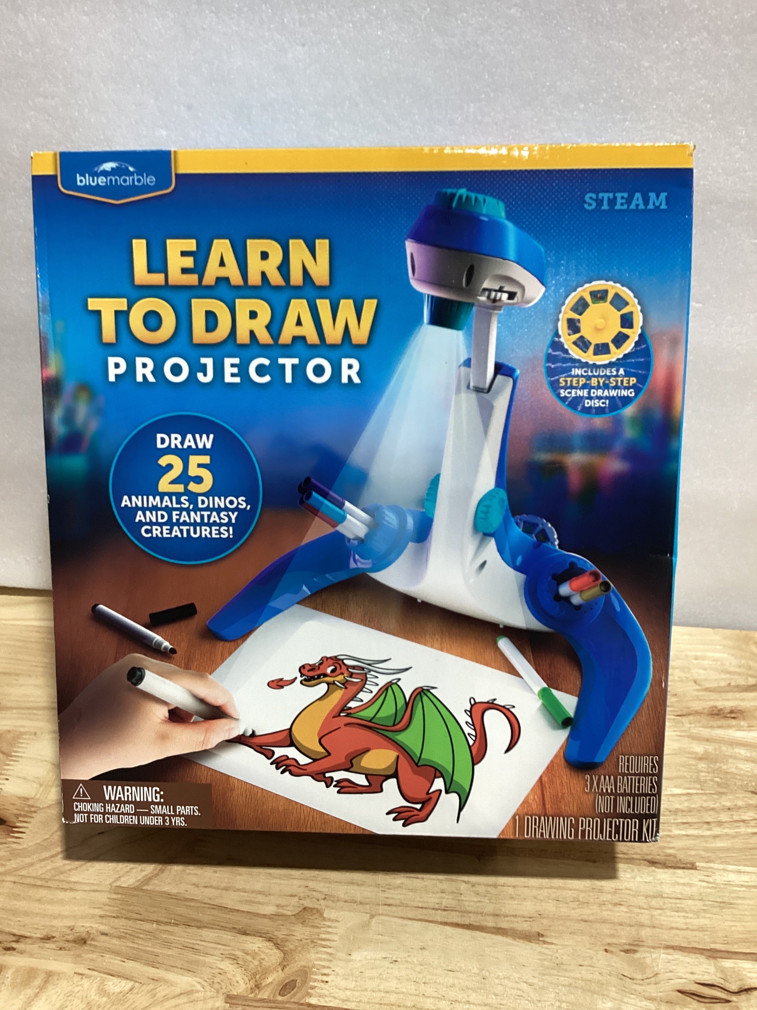 Proyector para Aprender a Dibujar Blue Marble — 9 Marcadores, 4 Discos con 25 Animales y Dinosaurios