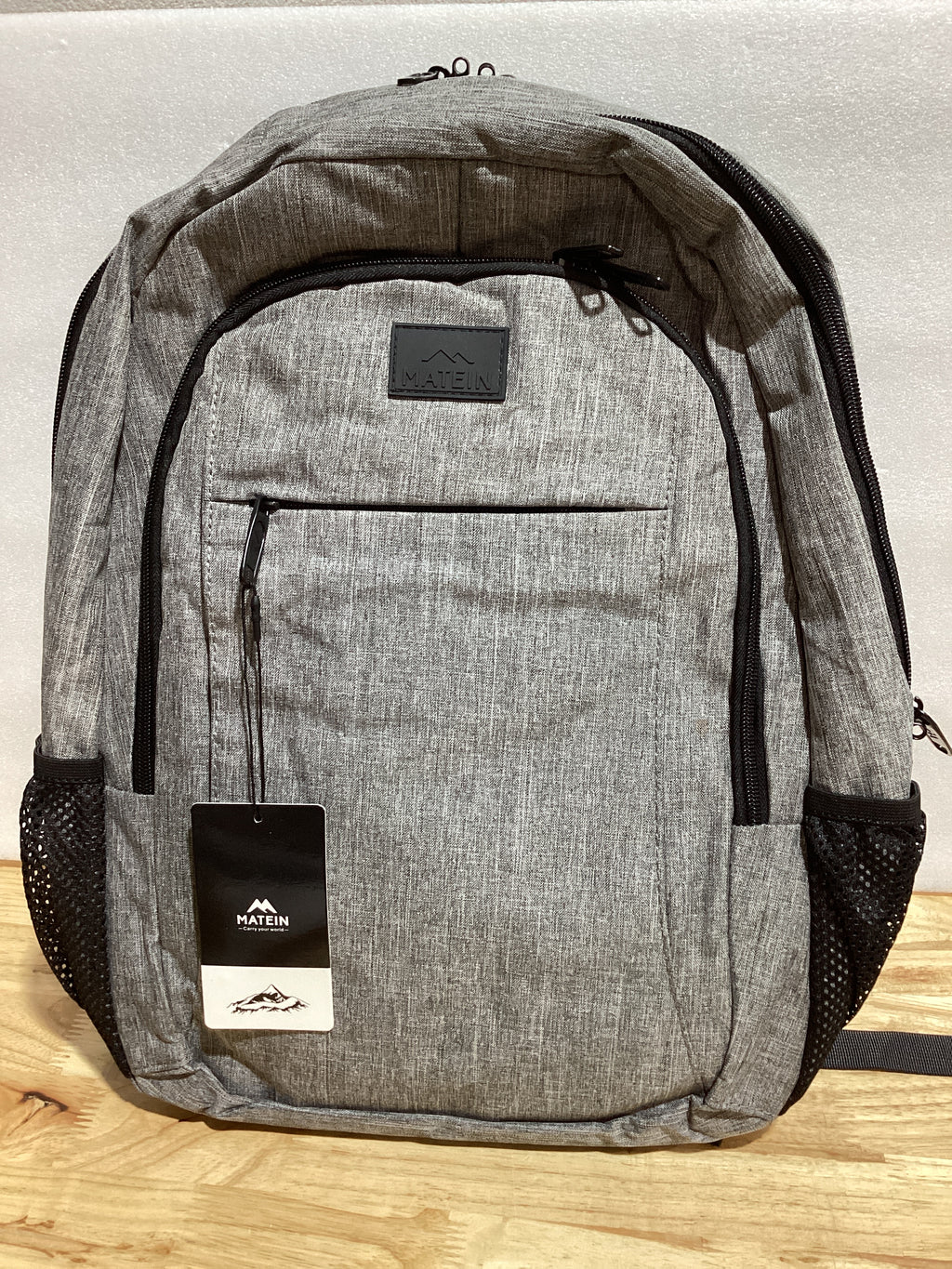 MATEIN - Mochila de viaje para laptop, mochila empresarial antirrobo, delgada, resistente, puerto de carga USB, impermeable, para universidad o escuela, para notebooks de 15.6 pulgadas, gris