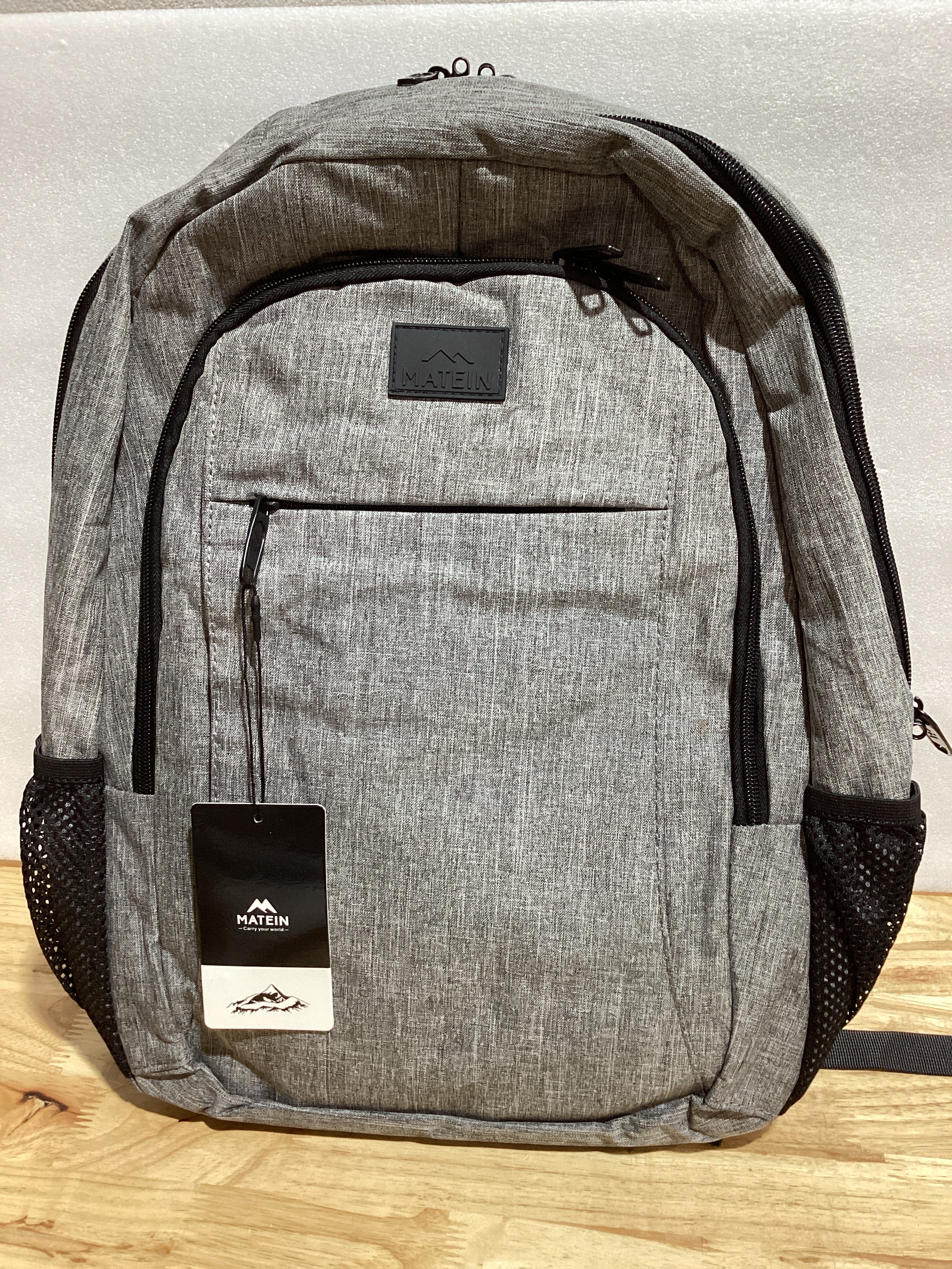 MATEIN - Mochila de viaje para laptop, mochila empresarial antirrobo, delgada, resistente, puerto de carga USB, impermeable, para universidad o escuela, para notebooks de 15.6 pulgadas, gris