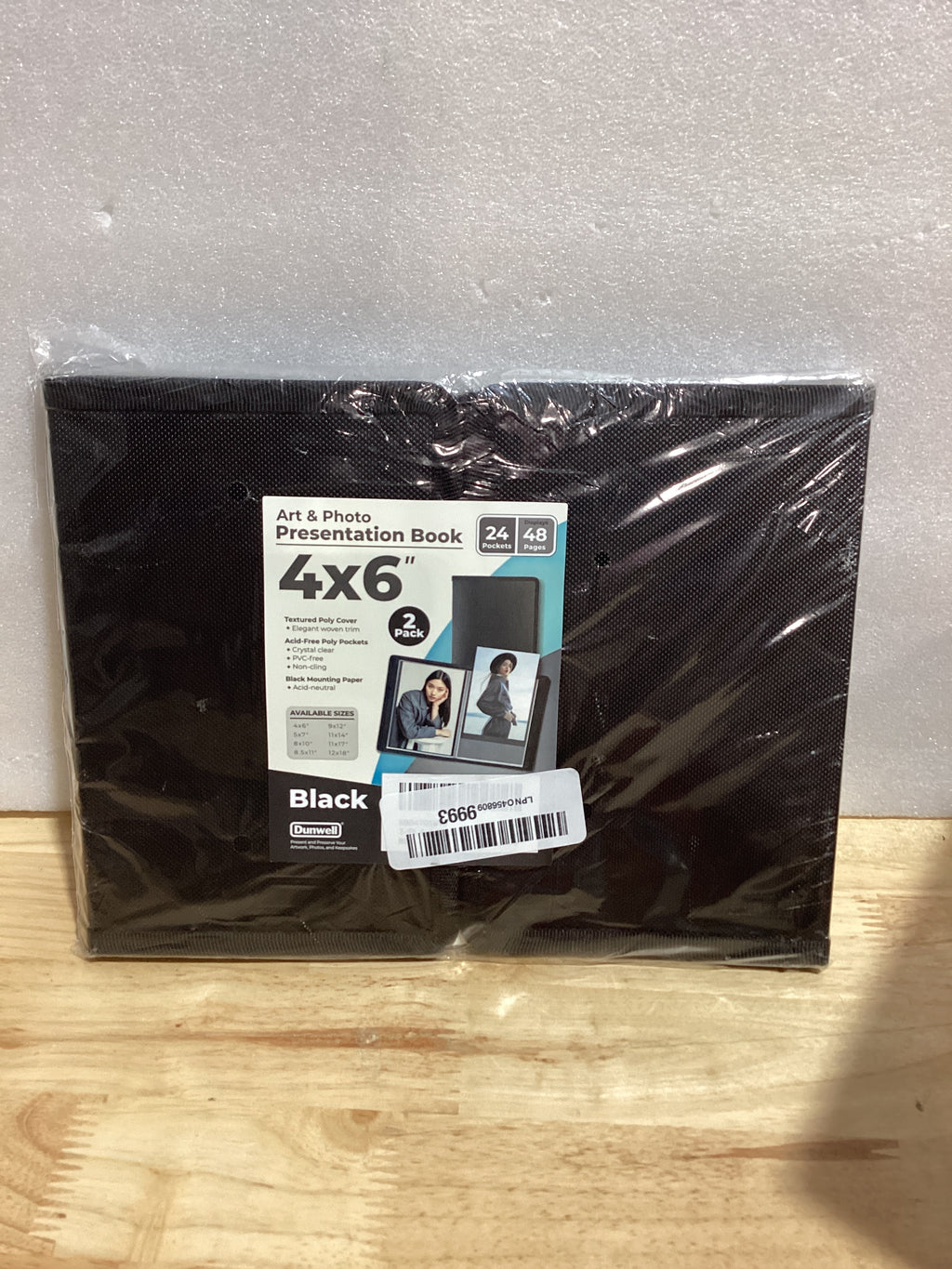 Álbum de fotos Dunwell 4x6 (2 paquetes, negro), papel de montaje, pequeño portafolio de arte de 4 x 6, carpeta de presentación con 24 fundas transparentes que muestran 48 páginas, libro de imágenes