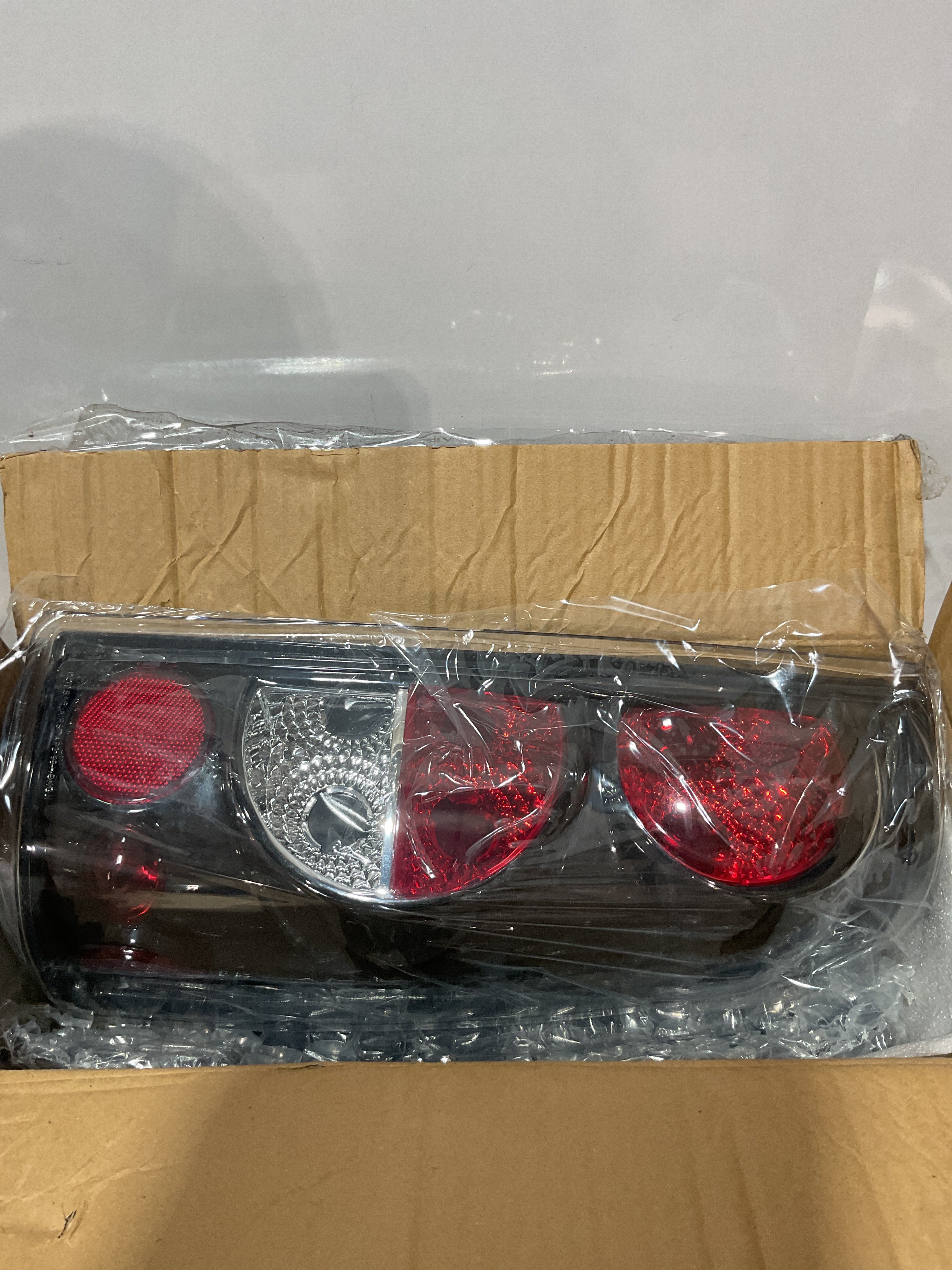 Luces Traseras Boine para Chevy Silverado / GMC Sierra 1999-2006 | Lente Negro Transparente OE – Par Completo