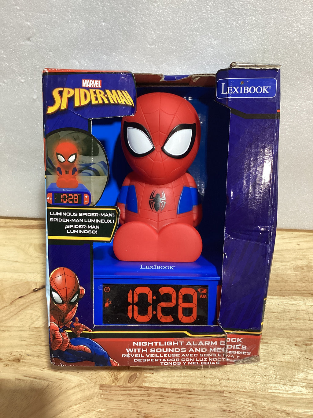 LEXiBOOK Reloj Despertador Digital Spider-Man | Luz Nocturna, Snooze y Efectos de Sonido Marvel | Niños | Azul