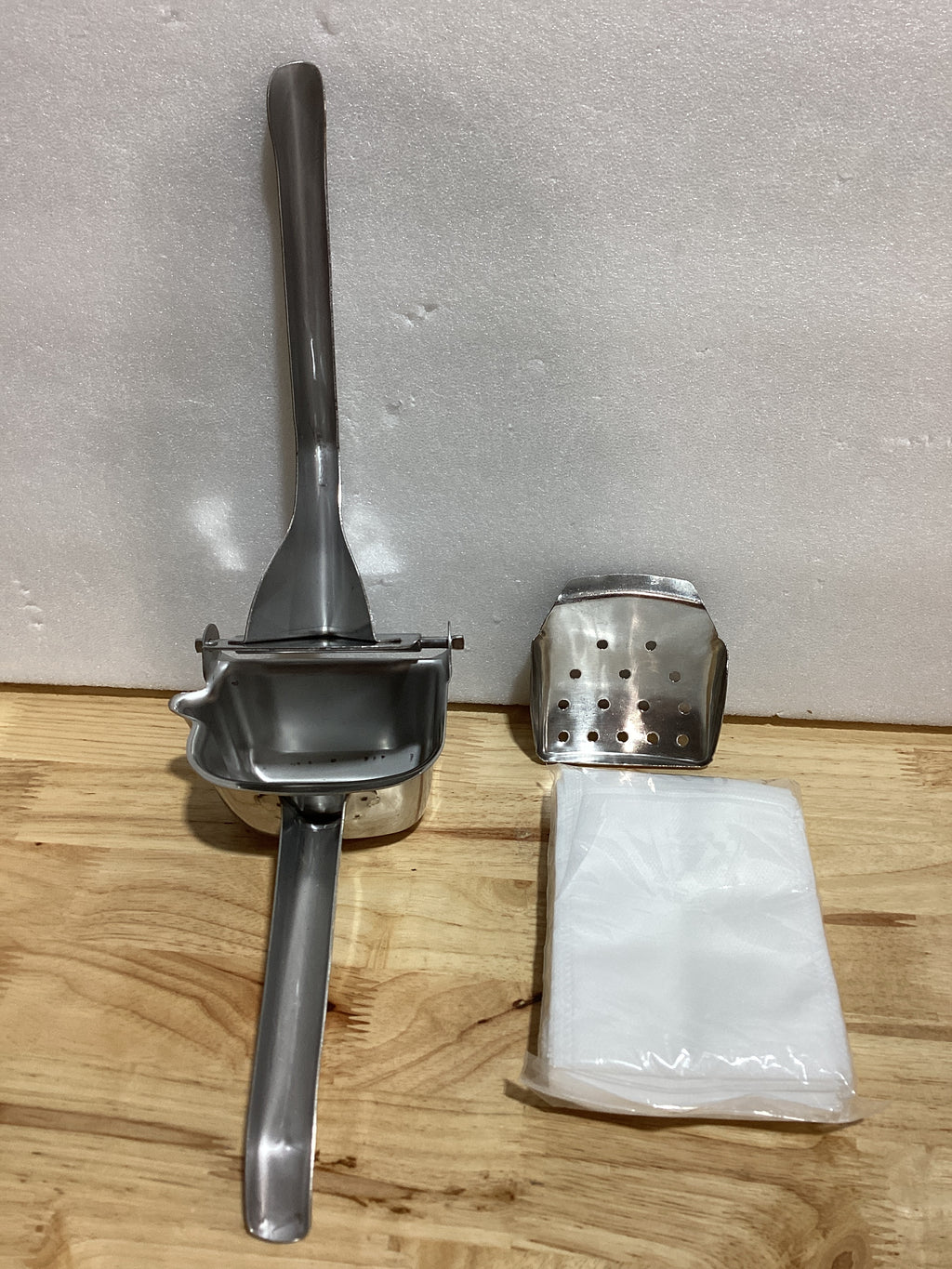 Exprimidor Manual de Acero Inoxidable – Citrus Juicer con 50 Bolsas Filtro