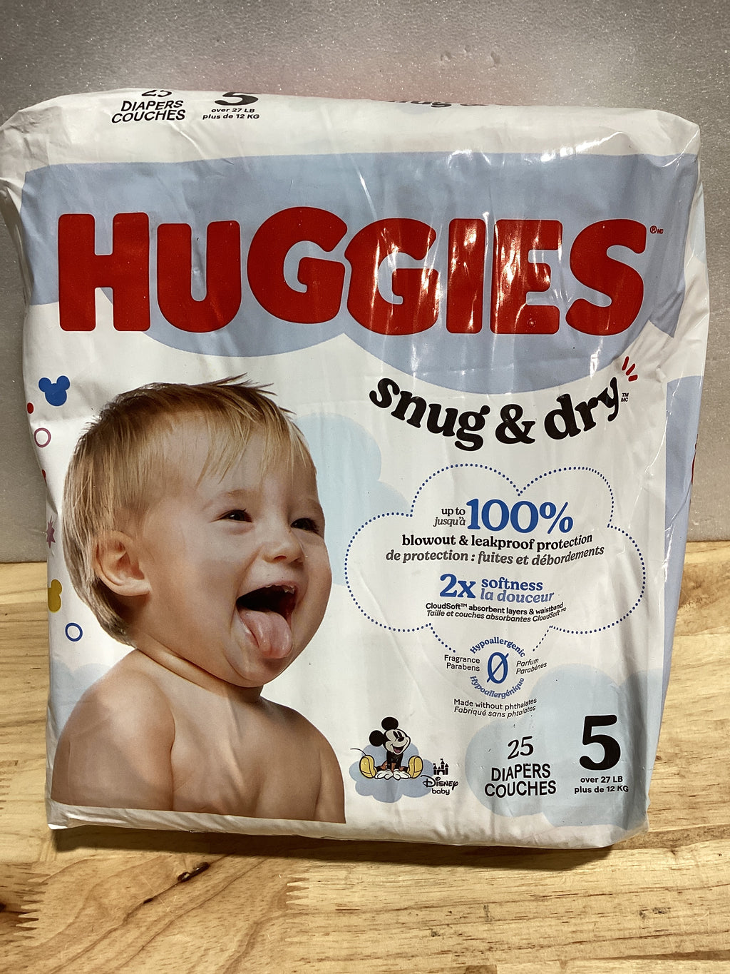 Huggies Pañales de tamaño 5, pañales para bebé Snug & Dry, talla 5 (27+ libras), 25 unidades, el embalaje puede variar