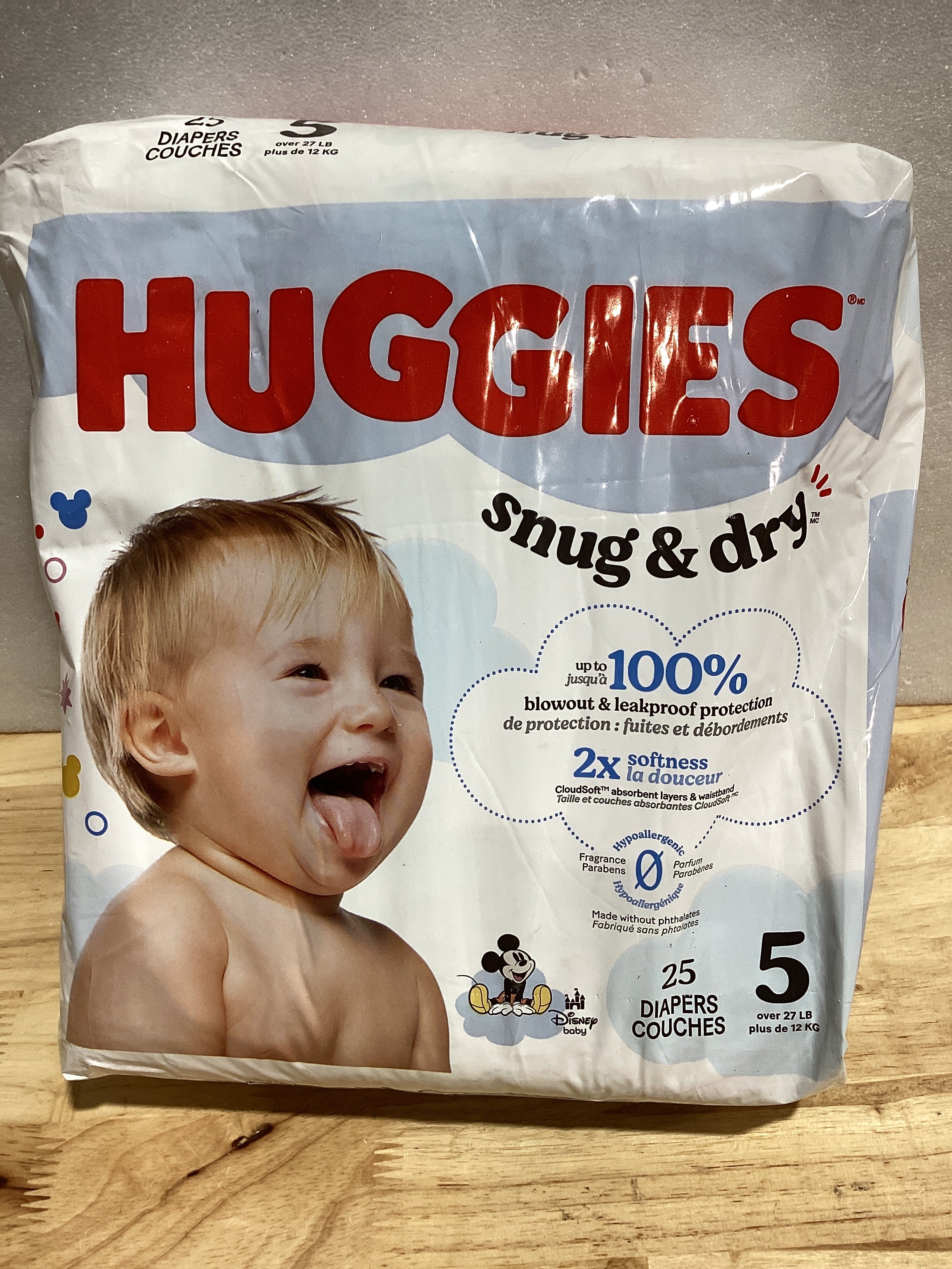 Huggies Pañales de tamaño 5, pañales para bebé Snug & Dry, talla 5 (27+ libras), 25 unidades, el embalaje puede variar